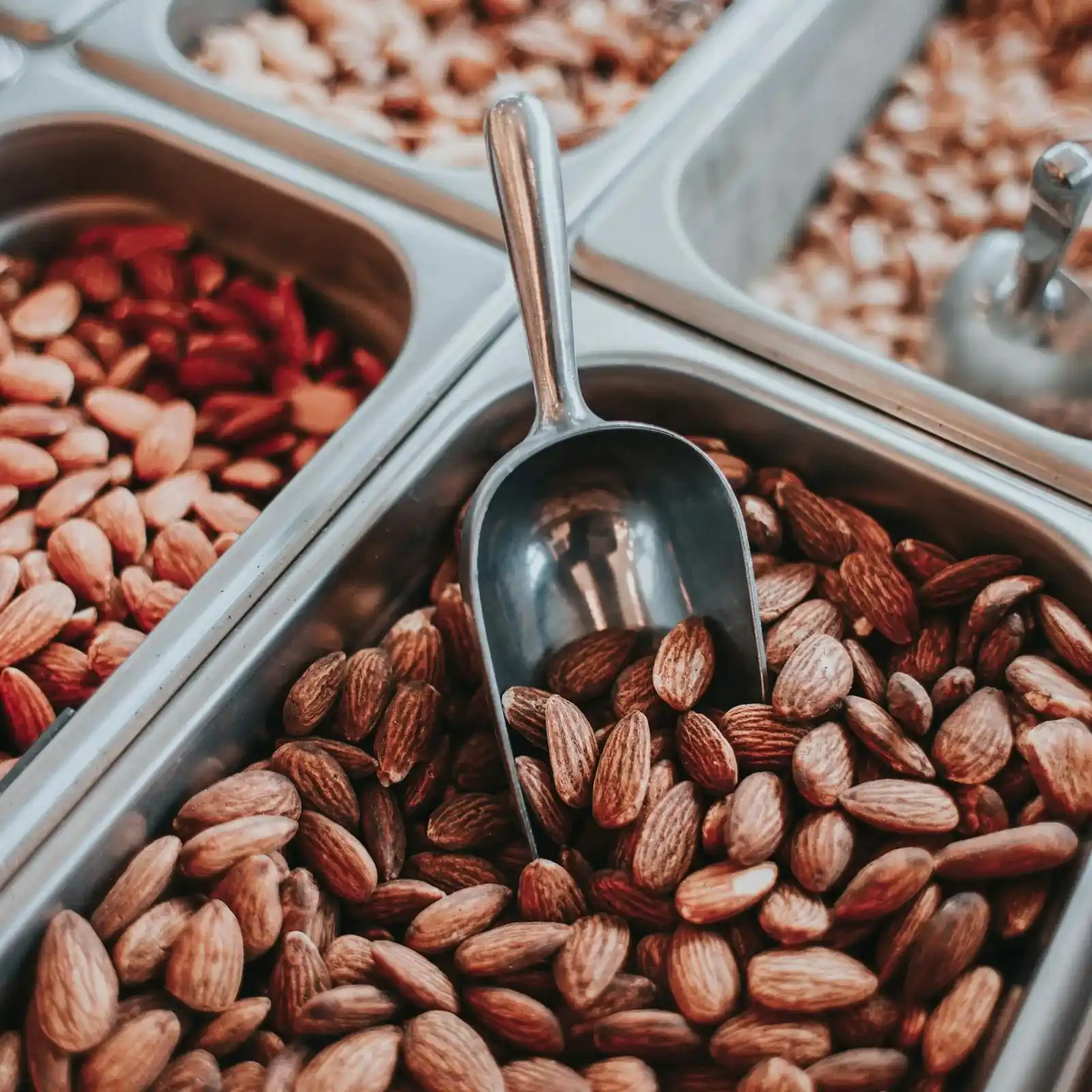 Almonds with a metal scoop